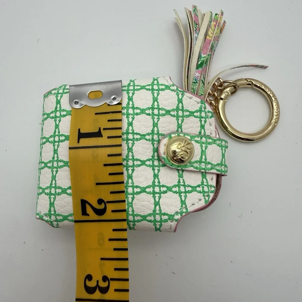 Lilly Pulitzer faux leather wireless earbud case in the Spearmint Caning Print